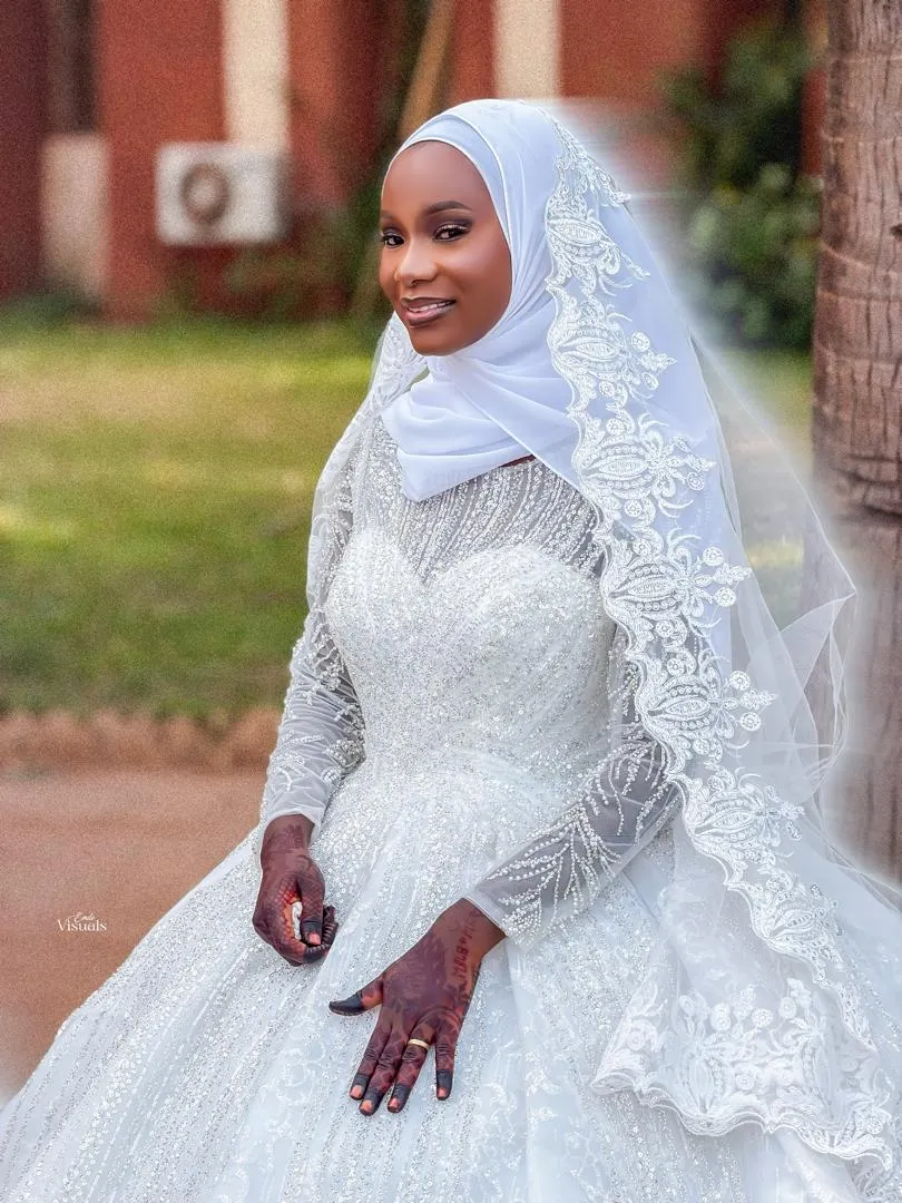 Bride in an embroidered gown outdoors