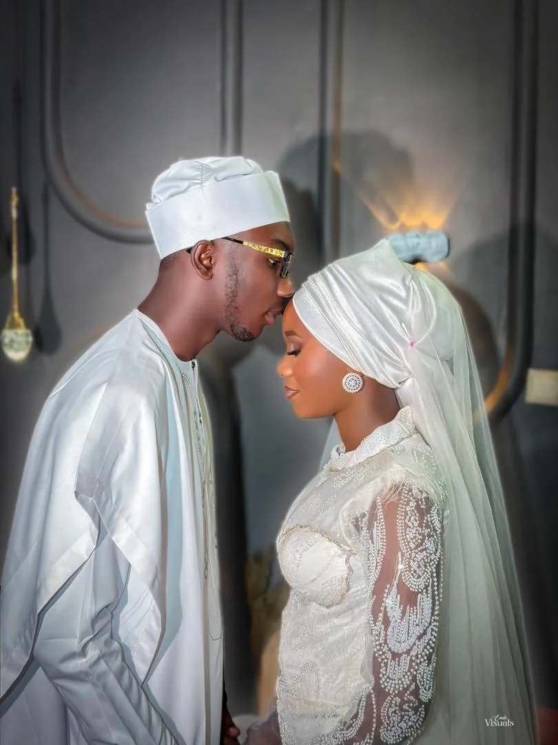 A forehead kiss before the ceremony
